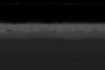 Black spray paint ink texture. Graffiti painting on the wall. Street art and vandalism. Digitally airbrushed paper background.