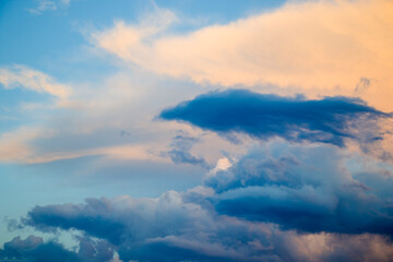 Naklejka na ściany i meble Cloudy sky background, sunset time