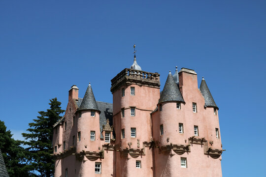 View of Craigievar Castle in Aberdeenshire Scotland Against a Clear Blue Sky