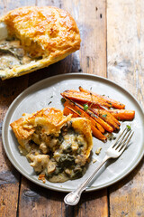 Chicken and mushroom pie with roast carrots