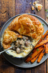 Chicken and mushroom pie with roast carrots