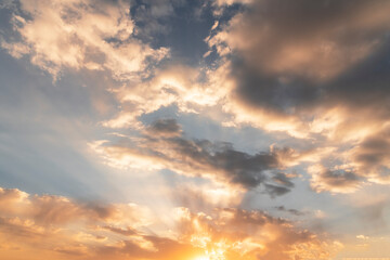 Beautiful bright sunset sky. Dramatic colorful clouds after sunset. Nature, sunset clouds backgrounds.