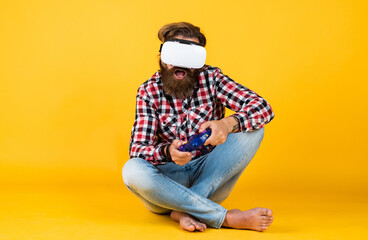 man with glasses of virtual reality. Visual reality concept. guy getting experience using VR-headset glasses. bearded hipster use modern technology. game console. Future technology