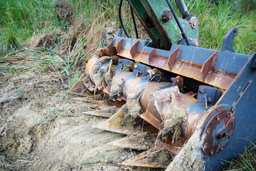 Shovel of an industial bulldozzer in mud