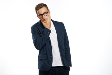 Business man in a jacket with glasses emotions official manager light background studio