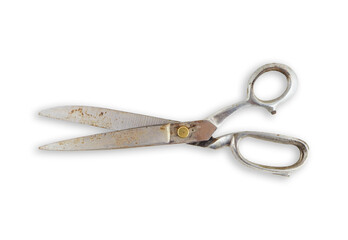 Rusty old vintage scissors on white background