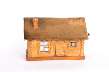 model of a wooden house isolated on white background