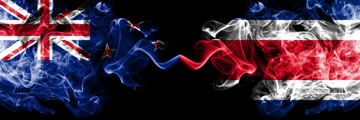 New Zealand vs Costa Rica smoky mystic flags placed side by side. Thick colored silky abstract smoke flags