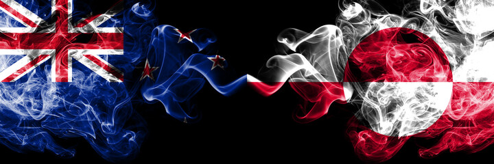 New Zealand vs Greenland smoky mystic flags placed side by side. Thick colored silky abstract smoke flags