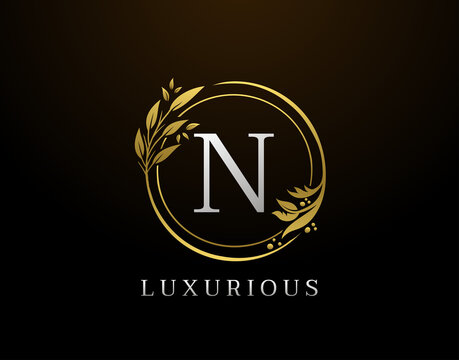 Elegant N Letter Floral Design. Circle Luxury N Gold Logo Icon.