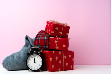 Christmas and New Year countdown concept with alarm clock