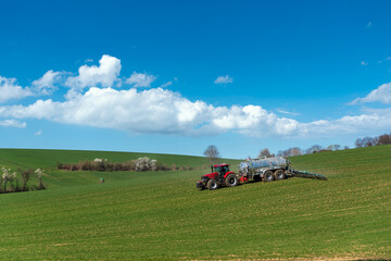 Tractor plows a field in Johlingen
