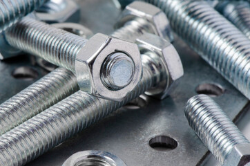 Metal bolts and nuts. Tools for working and fixing. Macrophotography.