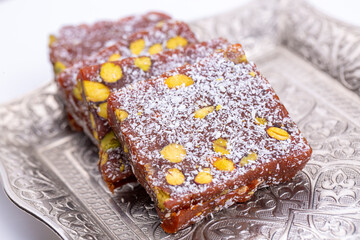 Traditional turkish dessert cezerye on the white background