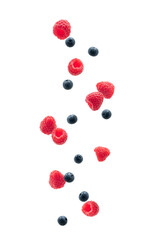 Blueberries and raspberries falling, with a white background.