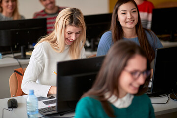 Female students enjoying an informatics lecture