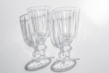 Two glasses on a white background.