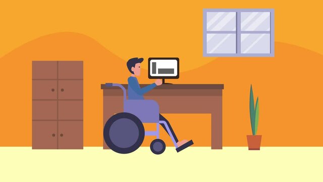 Disabled man working with a computer in the office