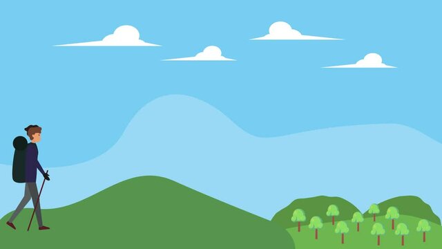 Male hiker walking on the hill to looks at nature