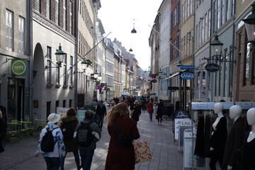 People at Stroget street - Copenhagen central shopping street. Copenhagen is the capital of Denmark.