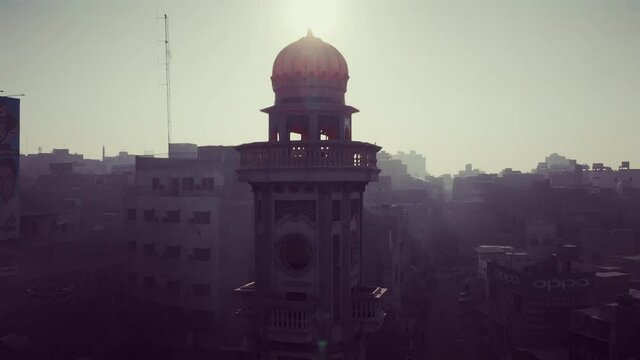 Aerial View Of Ghanta Ghar In Sukkur, Pakistan During Morning. Follow Shot
