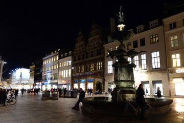 Fototapeta premium Street life in Copenhagen. People walking, riding bikes in the city center.