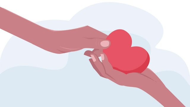 Volunteer hands give heart symbol to a needing hand