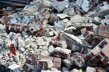 The bricks and debris of a demolished building