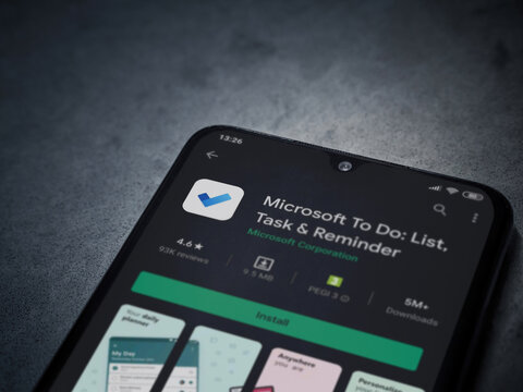 Lod, Israel - July 8, 2020: Microsoft To Do app play store page on the display of a black mobile smartphone on dark marble stone background. Top view flat lay with copy space.