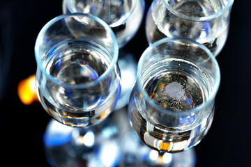 Close up photo of Champagne glasses against bokeh background