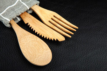 Fototapeta na wymiar image of wooden spoon fork knife 