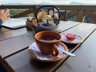 cup of tea in clay dishes