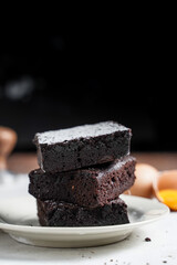 homemade chocolate brownies on grey background