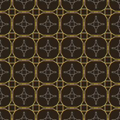 Naklejka premium Gold on black seamless tiling pattern, background, wallpaper texture