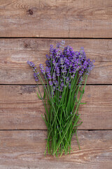 Lavender flowers on a wooden background.
