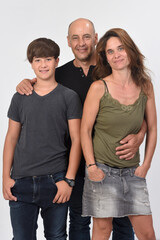 Fototapeta premium portrait of a family with a teenage son standing on white background