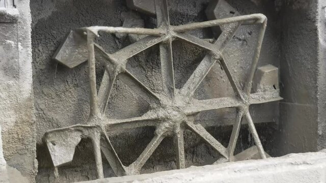Detail of the construction site-mixing screw concrete mixer close-up