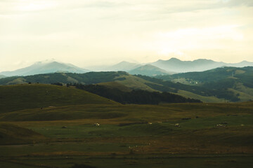 Fototapeta premium Mountains after rain, weather is getting better, dark photo in warm colors, montenegro