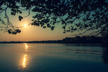 Sunrise on Amazon forest river