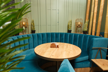 Large round sofa in blue for a large company