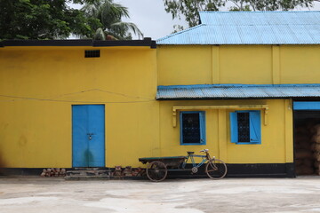 Fototapeta na wymiar A simple village house with a beautiful wall paint