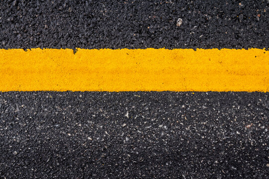 Asphalt Road Surface With Yellow Line