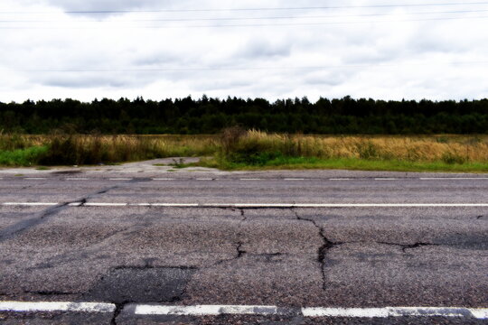 cracked asphalt on a rural dorga