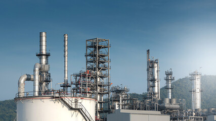 Close up Industrial view at oil refinery plant form industry zone with sunrise and cloudy sky