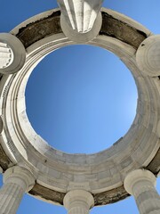 The sky framed by the crowning of the War Memorial, Ancona, Italy.