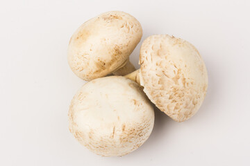 Fototapeta na wymiar Fresh Champignon mushroom, isolated on white background. Close-up