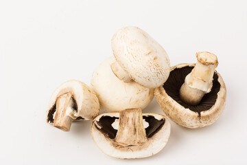 Fresh Champignon mushroom, isolated on white background. Close-up