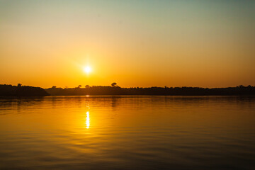 Fototapeta na wymiar Sunrise on Amazon forest river