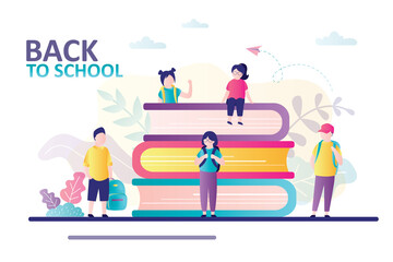 Classmates meet after summer vacations. Back to school. Children with backpacks. Schoolgirl sits on stack of textbooks