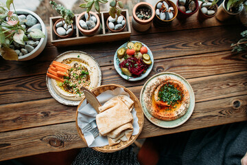 at cafe with hummus dishes